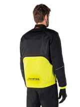 Alpinestars Mootant Waterproof Parka, Motorcycle Jacket, Lime Punch and Black, back view showing black upper mesh and bright lime green lower section, featuring MO.ST.EQ. branding, worn with black riding pants and gloves