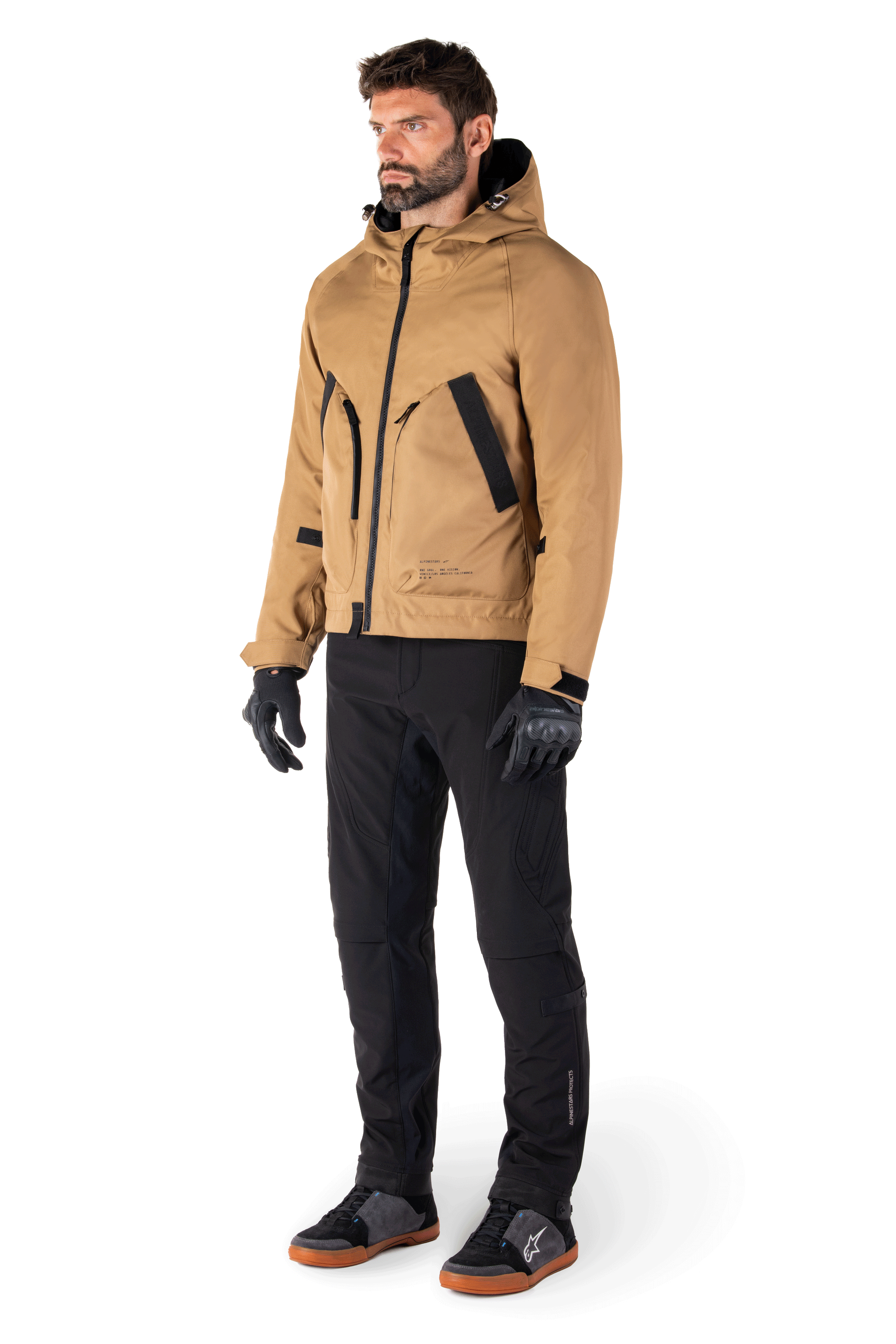 Alpinestars Morush Waterproof Parka in Utility Brown, minimalist streetwear-inspired motorcycle jacket from the MO.ST.EQ. collection, featuring a stormproof hood, large dual-access front pockets, and an ergonomic parka silhouette.