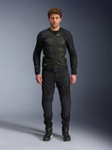 Male model wearing Alpinestars Troop-Air Jacket in Black Yellow Fluo, featuring technical mesh panels and bright yellow accents, paired with black riding pants and shoes, contemporary motorcycle apparel for warm weather