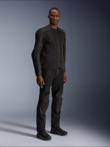 Alpinestars C-1 Air Jacket, Black, worn by a model with matching black motorcycle pants and shoes, featuring large tech mesh panels for airflow, clean urban aesthetic with a streamlined fit.