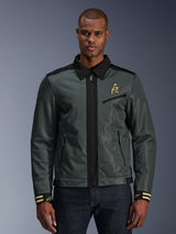 Alpinestars Ignite Air Jacket, urban motorcycle jacket, dark forest green with black accents, featured on model with denim pants, Harrington-style shirt collar, zippered front, chest logo, and striped cuffs, modern mesh and textile construction for summer riding
