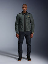Alpinestars Ignite Air Jacket in Urban Gray Black Blue, Harrington-style motorcycle jacket with shirt collar and mesh construction, worn by a man with dark denim jeans and black sneakers, urban streetwear for riders.