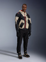 Alpinestars Mogress Air Jacket in Black, Almond, and Hot Orange, an urban textile motorcycle jacket with utility design.