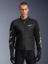 Alpinestars T-Dyno Air Jacket, Black textile motorcycle jacket, featuring white star graphics on sleeves and logo on chest, mesh panels for ventilation, vintage-inspired biker fit, worn with black gloves and pants