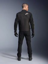 Alpinestars T-Dyno Air Jacket, Black, Rear view on model, Textile motorcycle jacket featuring 3D mesh panels and a white star logo on the shoulder, worn with black pants and gloves, modern urban riding outfit