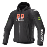 Alpinestars FQ20 Zaca Air Monster Jacket, Black textile motorcycle jacket with hood, featuring red and white "20 El Diablo" graphics, green Monster Energy claw logos, white ASTARS branding on sleeves, DFS Lite shoulder sliders, zip closure