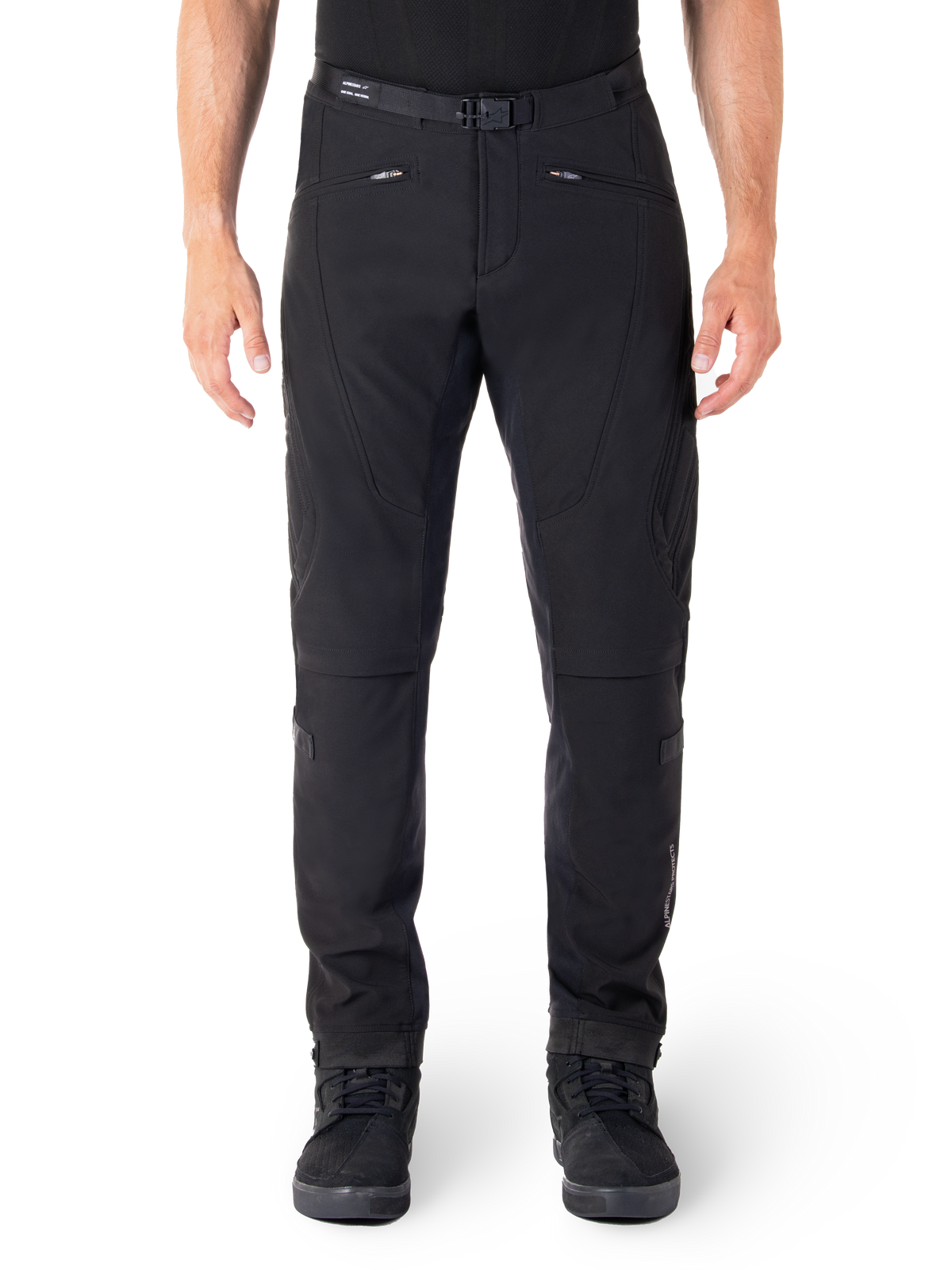 Alpinestars Alden Pants, Black Urban Motorcycle Pants, front view, technical stretch softshell fabric, integrated belt with magnetic buckle, zippered front pockets, quilted knee detailing, slim-fit silhouette, styled with black riding shoes
