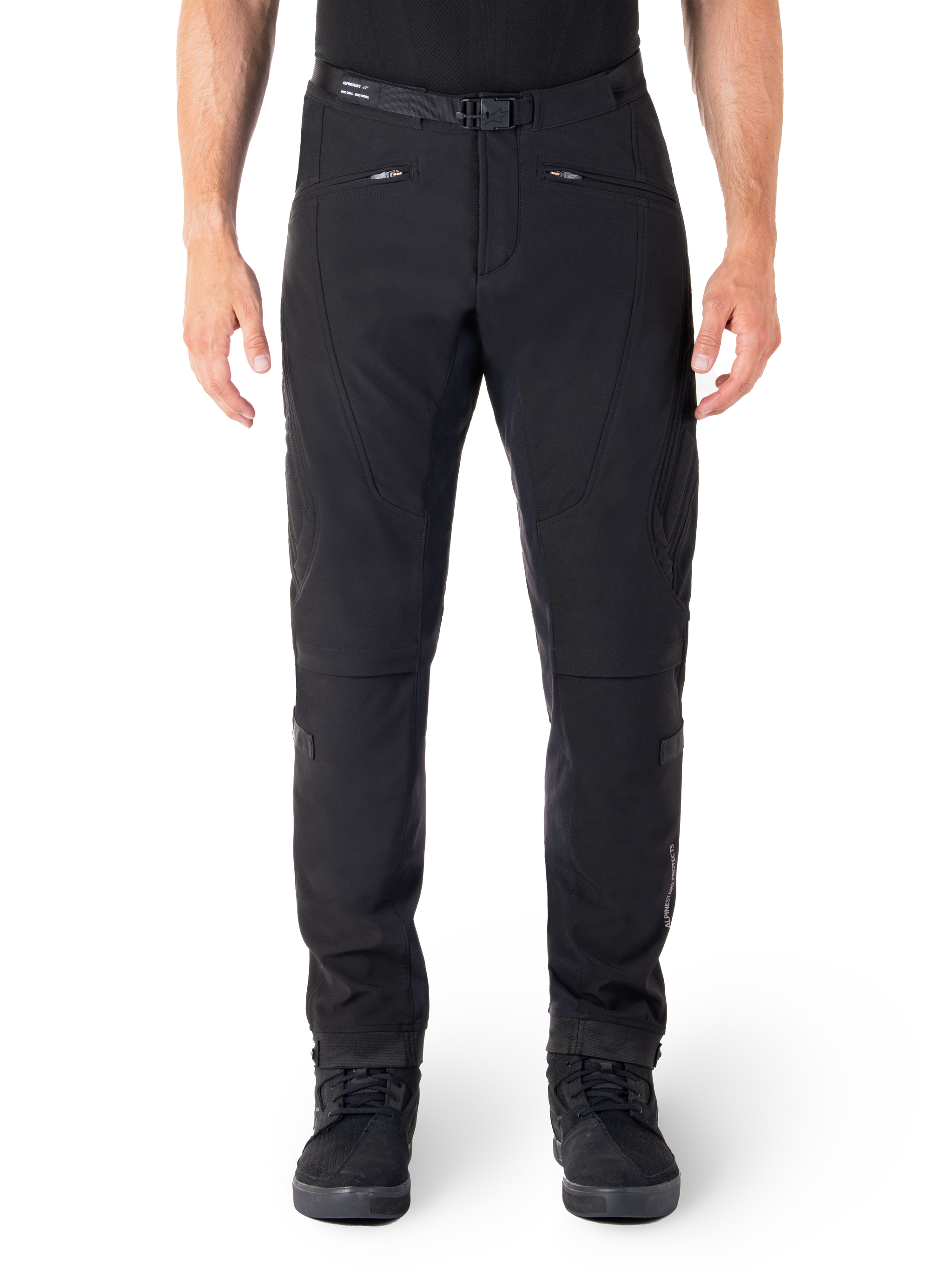 Alpinestars Alden Pants, Black Urban Motorcycle Pants, front view, technical stretch softshell fabric, integrated belt with magnetic buckle, zippered front pockets, quilted knee detailing, slim-fit silhouette, styled with black riding shoes