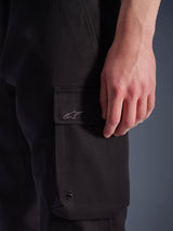 Alpinestars Flex-AST Cargo Pants, Urban Motorcycle Pants, Black, close-up of side cargo pocket with embroidered Astar logo, metal eyelet, and durable stretch twill texture