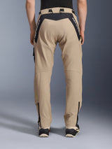 Alpinestars Acteon Pants, Urban Motorcycle Pants, Sand, rear view featuring black ripstop panels with white branding on the yoke, tapered fit with lower leg zippers, contemporary road riding gear
