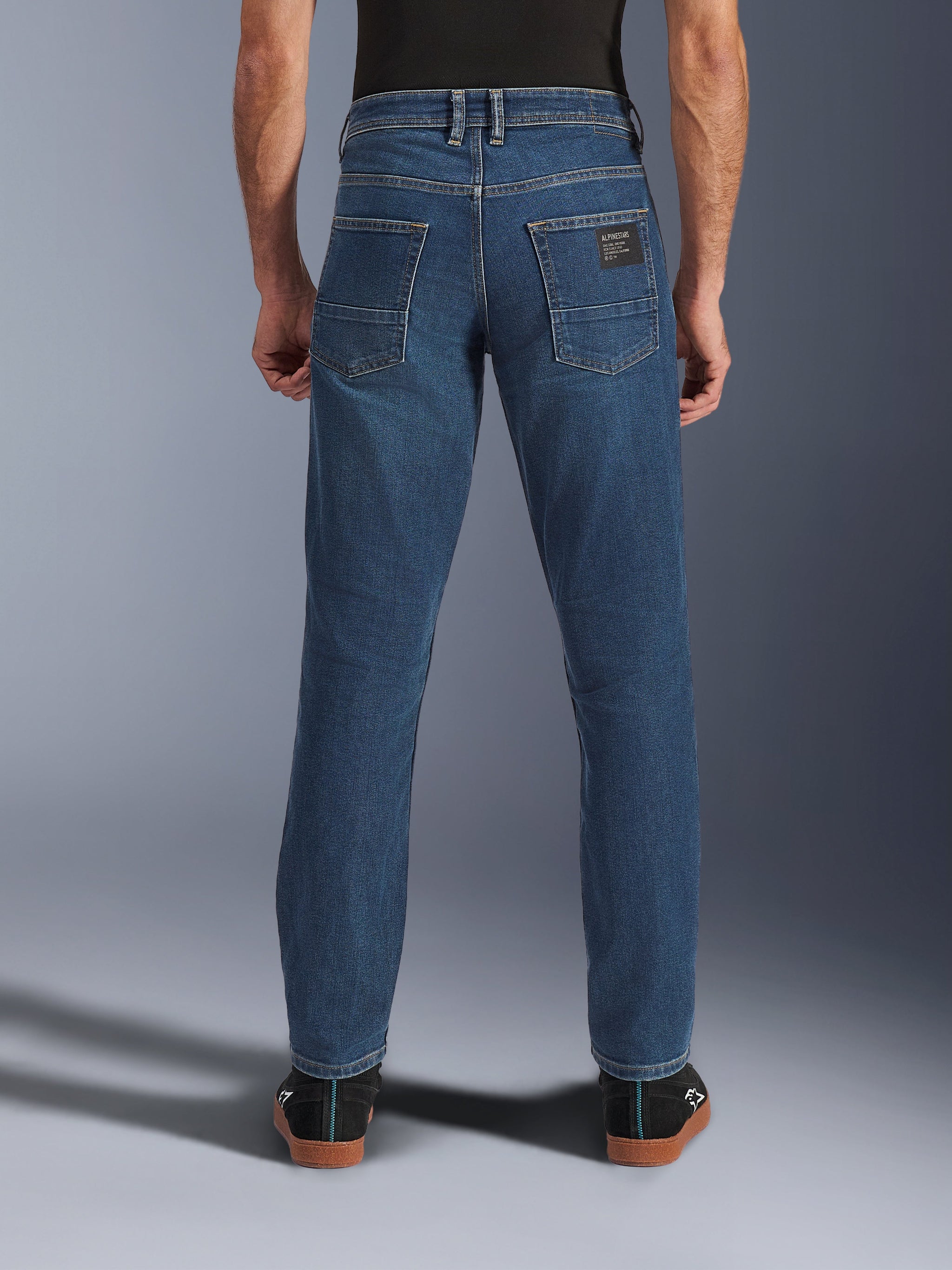 Alpinestars Flex-AST 5 Denim Pants, Urban Motorcycle Denim, Indigo Washed blue, rear view showing tapered fit and back pockets with branding patch, casual street styling