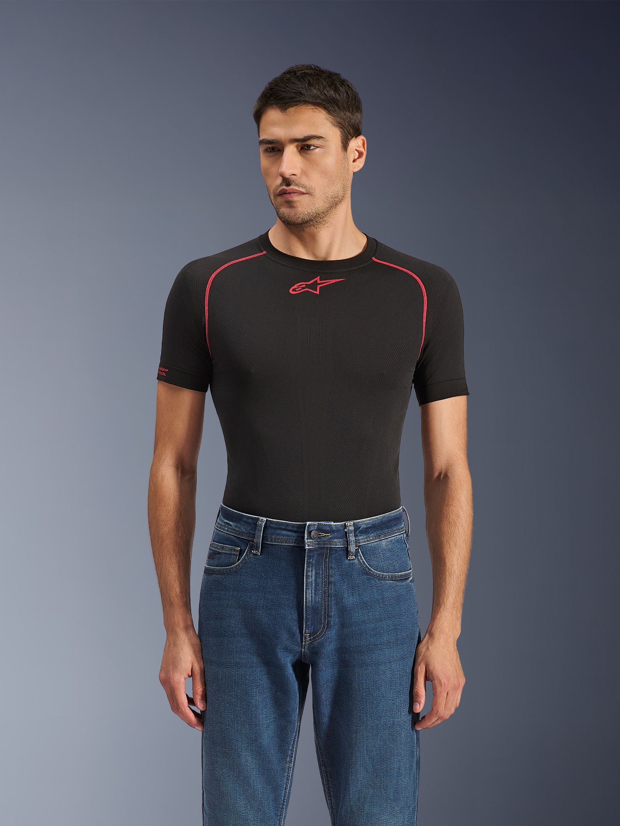 Alpinestars Flex-AST 5 Denim Pants, Indigo Washed, urban motorcycle jeans worn by a model with a black technical base layer, classic five-pocket styling with a modern tapered fit