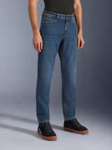 Alpinestars Flex-AST 5 Denim Pants, Indigo Washed motorcycle jeans, regular tapered fit, worn with black high-top sneakers and a black shirt, casual urban riding gear featuring a classic denim appearance.