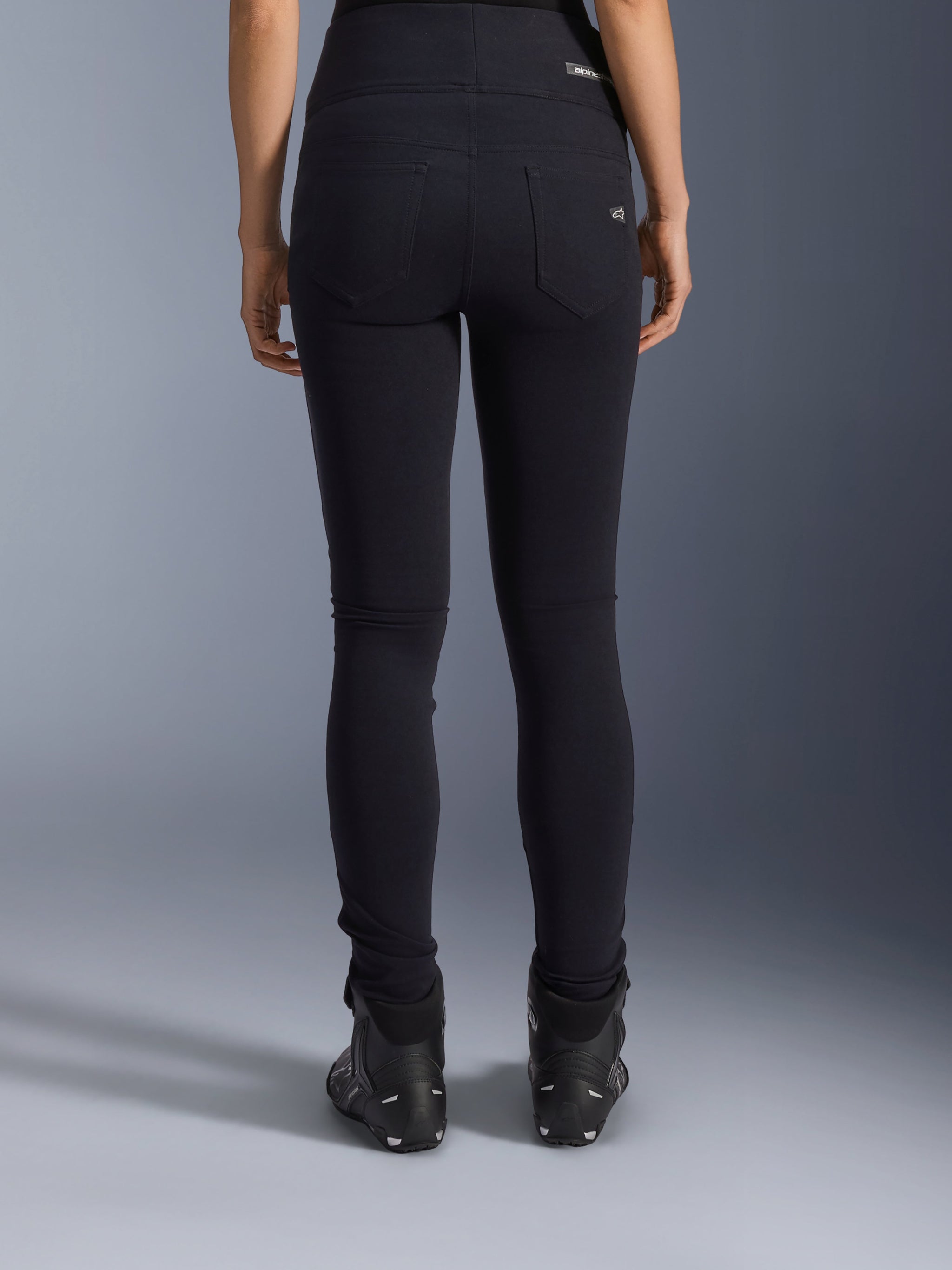 Alpinestars Stella Flex-Ast Leggings, Women's Motorcycle Leggings, Black, rear view showing back pockets and slim fit, worn with black motorcycle boots, urban riding style