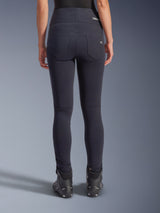 Alpinestars Stella Flex-AST Leggings, Urban Motorcycle Pants, Black, back view featuring high-waisted skinny fit, two functional back pockets with subtle branding, stretch textile material, worn with black riding shoes.