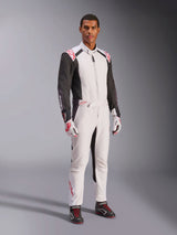 Alpinestars KMX-5 V3 Suit, White Black and Bright Red, one-piece karting suit worn with matching white and red gloves and black racing shoes, featuring black sleeves and bold red accents, professional motorsport gear for competitive karting