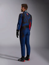 Alpinestars KMX-9 V3 Graphic 5 Suit, Karting Suit, Navy Red, rear view showing a navy blue body with a dark camo-inspired graphic on the back and red accents, worn with black racing gloves and black and red karting shoes.