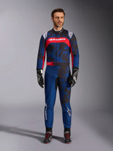Alpinestars KMX-9 V3 Graphic 5 Suit, Karting Suit in Navy and Red, featuring an abstract camo-style graphic pattern, worn by a model with black racing gloves and shoes, athletic design with prominent Alpinestars branding on the chest and legs.