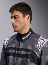 Alpinestars KMX-9 V3 Graphic 5 Suit, Karting Suit, Dark Gray and Black camouflage pattern, close-up of collar and shoulders with white logos, professional racing apparel