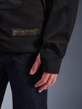 Alpinestars MO.ST.EQ Hybrid Hooded Jacket, Black, close-up of sleeve cuff with thumb loop, holographic MO.ST.EQ logo patch, urban streetwear motorcycle jacket