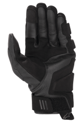 Alpinestars Phenom Leather Gloves, Motorcycle Gloves, Black, palm view featuring reinforced goat leather construction, padded landing zones, and short cuff design with adjustable wrist strap and Alpinestars logo pull tab