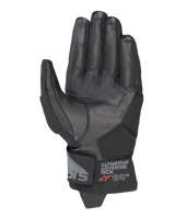 Alpinestars Corozal V3 Drystar® Gloves, Black, Palm side view showing leather construction with reinforced patches, short cuff with Alpinestars Adventure Tech branding, touchscreen-compatible fingertips, durable all-weather adventure motorcycle gear.