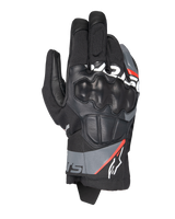Alpinestars Corozal V3 Drystar® Gloves, Adventure Motorcycle Gloves, Black with Deep Gray and Red Fluo accents, top-down view featuring leather-covered SP knuckle protection, textile and leather chassis, and short cuff design, waterproof adventure riding gear