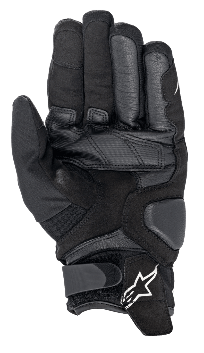 Alpinestars Smx-1 Drystar® Gloves, Waterproof Motorcycle Gloves, Black, palm view showing reinforced leather and synthetic suede construction, padded landing zones for durability, and a wrist closure with the white Alpinestars logo.