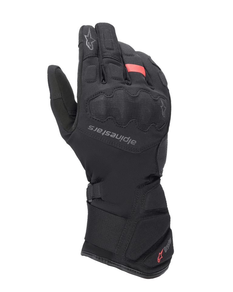Alpinestars Tourer W-7 V2 Drystar Gloves, Winter Motorcycle Touring Gloves, Black with red accents, featuring reinforced knuckle protection, Alpinestars logo on the back of the hand, and a long adjustable cuff with Drystar branding