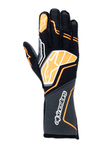 Alpinestars Tech-1 ZX V4 Gloves, Auto Racing Gloves, Black with Orange Fluo and White accents, featuring a large graphic logo on the back of the hand, honeycomb textured fabric on the cuff, sporty geometric design for professional racing