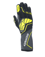 Alpinestars Tech-1 ZX V4 Gloves, Auto Racing Gloves, Tar Gray, Black and Yellow Fluo, featuring a large yellow star logo on the back and white branding on the cuff, honeycomb textured fabric with angular neon accents, professional motorsport gear.