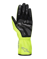Alpinestars Tech-1 K Race V2 Pure Gloves, Karting Gloves, Yellow Fluo and Black, palm view showing white dotted silicone grip pattern, gray Alpinestars logo and 'ONE GOAL' text on the gauntlet cuff, professional motorsport gear