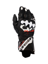 Alpinestars GP Plus R V3 Leather Gloves, Motorcycle Racing Gloves, Black with White and Red accents, featuring white DFS knuckle protectors, perforated leather for breathability, and bold Alpinestars branding on the cuff