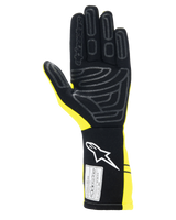 Alpinestars Tech-1 Start V4 Gloves FIA, Auto Racing Gloves, Yellow Fluo and Black, palm view featuring silicone grip patterns, extended cuff with white logo and FIA certification label