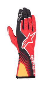 Alpinestars Youth Tech-1 K Race S V2 Future Gloves, Red Tangerine, back view showing red and black technical design, white Alpinestars logo, tangerine yellow cuff accent, and white ASTARS branding on the wrist