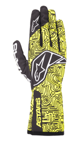 Alpinestars Tech-1 K Race V2 Vertical Gloves, Karting Racing Gloves, Yellow Fluo and Black, featuring a white star logo, intricate abstract line pattern, and ASTARS branding on the cuff, lightweight design for motorsport performance