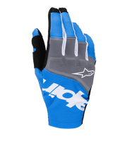 Alpinestars 2025 Techstar Gloves, Motocross Racing Gloves, Blue and Gray with White and Black accents, featuring a white star logo on the knuckle panel, bold white branding across the backhand, and ribbed textile construction for off-road racing.