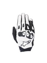 Alpinestars SP X 7 road racing gloves in white and black perforated leather with double-density TPU knuckles.