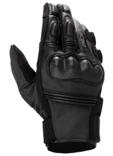 Alpinestars Stella Phenom Leather Air Glove, Women's Motorcycle Gloves, Black, backhand view highlighting hard perforated knuckle protection, padded finger joints, and premium leather texture.