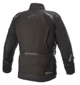 Alpinestars Ketchum GORE-TEX Jacket, Motorcycle Jacket, Black, rear view featuring an elongated touring cut, reflective details on the shoulders and arms, with Alpinestars branding on the upper back and lower waist area.