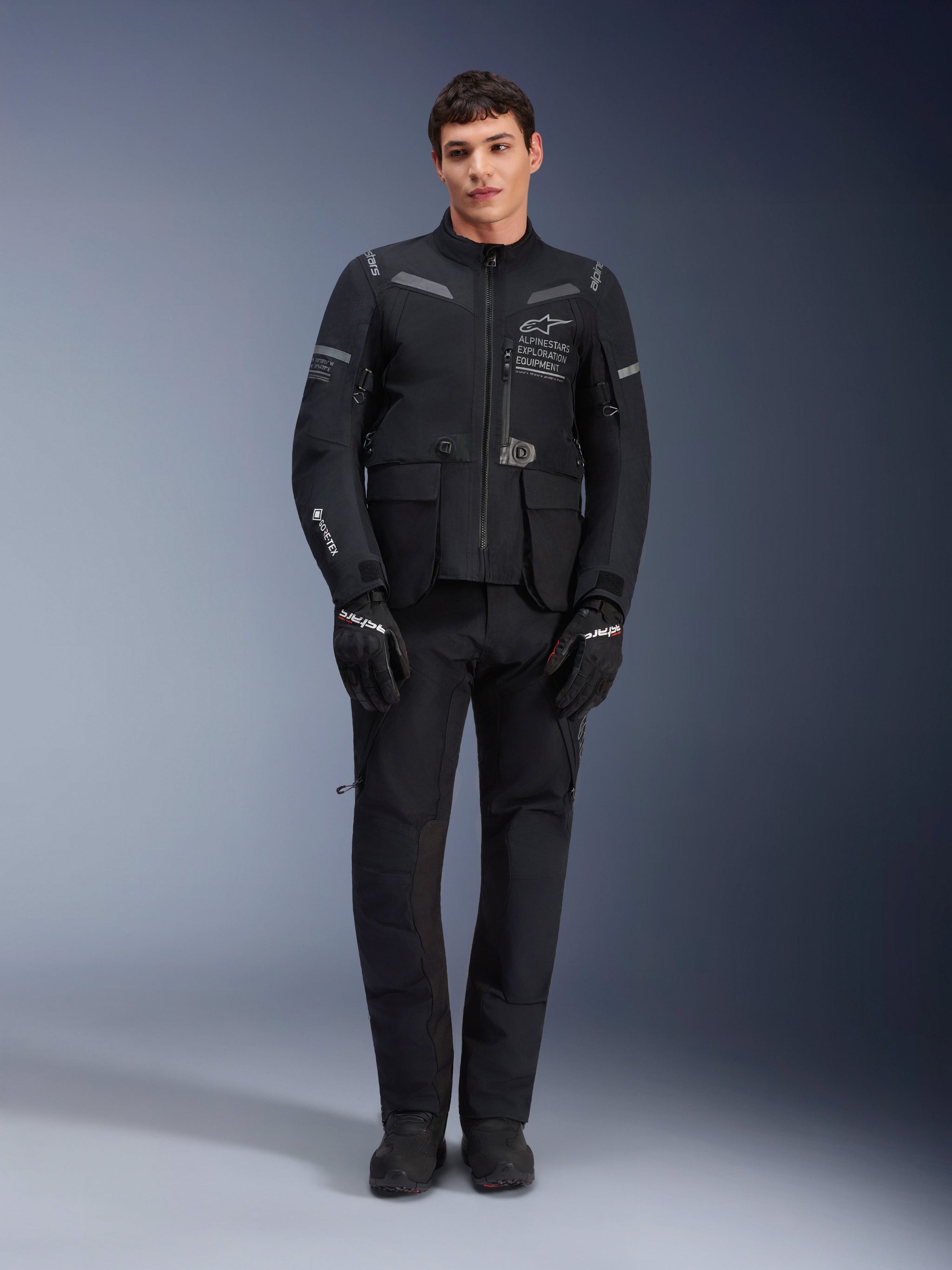 Alpinestars ST-7 2L GORE-TEX Pants, Black Motorcycle Touring Pants, Waterproof and Breathable, Full-body view worn with matching jacket, Premium technical construction for adventure riding