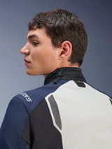 Alpinestars ST-7 2L GORE-TEX Jacket, close-up profile view of the back and neck area, Ice Gray Dark Blue and Black, featuring an adjustable shock cord collar and Tech-Air branding, premium adventure touring motorcycle jacket.