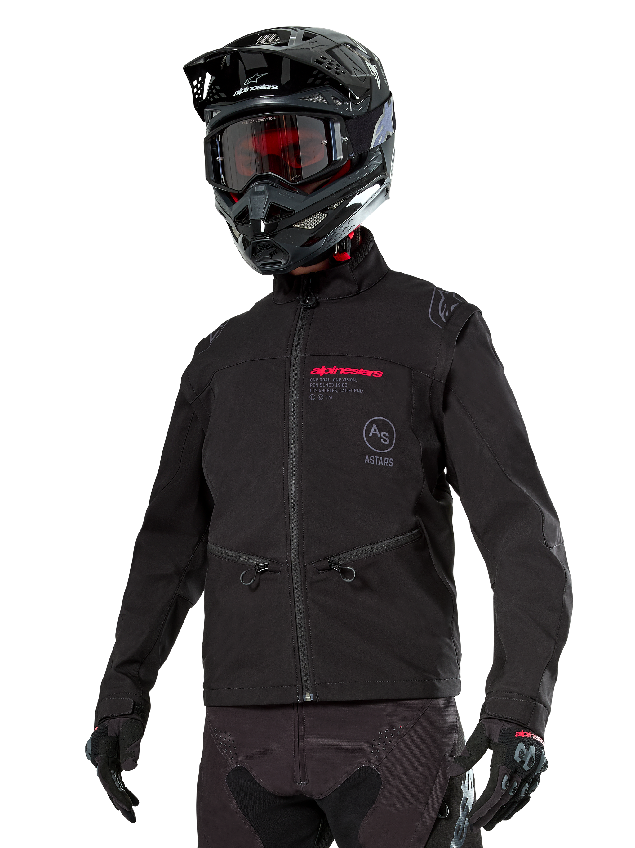 Alpinestars Lite-Dura Softshell Jacket, Black off-road motorcycle jacket with red branding and AS logo, worn with a black motocross helmet, red goggles, and black gloves, featuring zippered hand pockets and adjustable cuffs, designed for enduro riding.