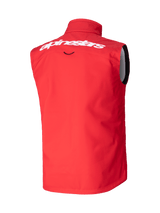Alpinestars Techstar Softshell Vest, Motocross Vest, Bright Red, Rear view featuring white Alpinestars wordmark on the upper back, windproof stretch softshell material, ergonomic sleeveless design for off-road riding