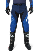 Alpinestars Pro-Dura Pants, Motocross Pants, Navy and Bright Blue with White accents, front view worn with black boots and gloves, technical design for enduro and off-road riding