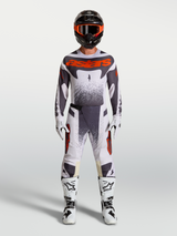 Alpinestars Techstar Swan Pants, men's motocross gear set in light lilac, dark gray, and red fluo with white boots.