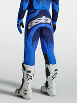 Alpinestars Techstar Swan Pants, Motocross Racing Pants for Men, Ucla Blue and Deep Blue, with large white seat logo.