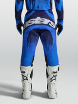 Alpinestars Techstar Swan Pants in blue and deep blue, men's motocross gear with bold rear logo and reinforced seat.