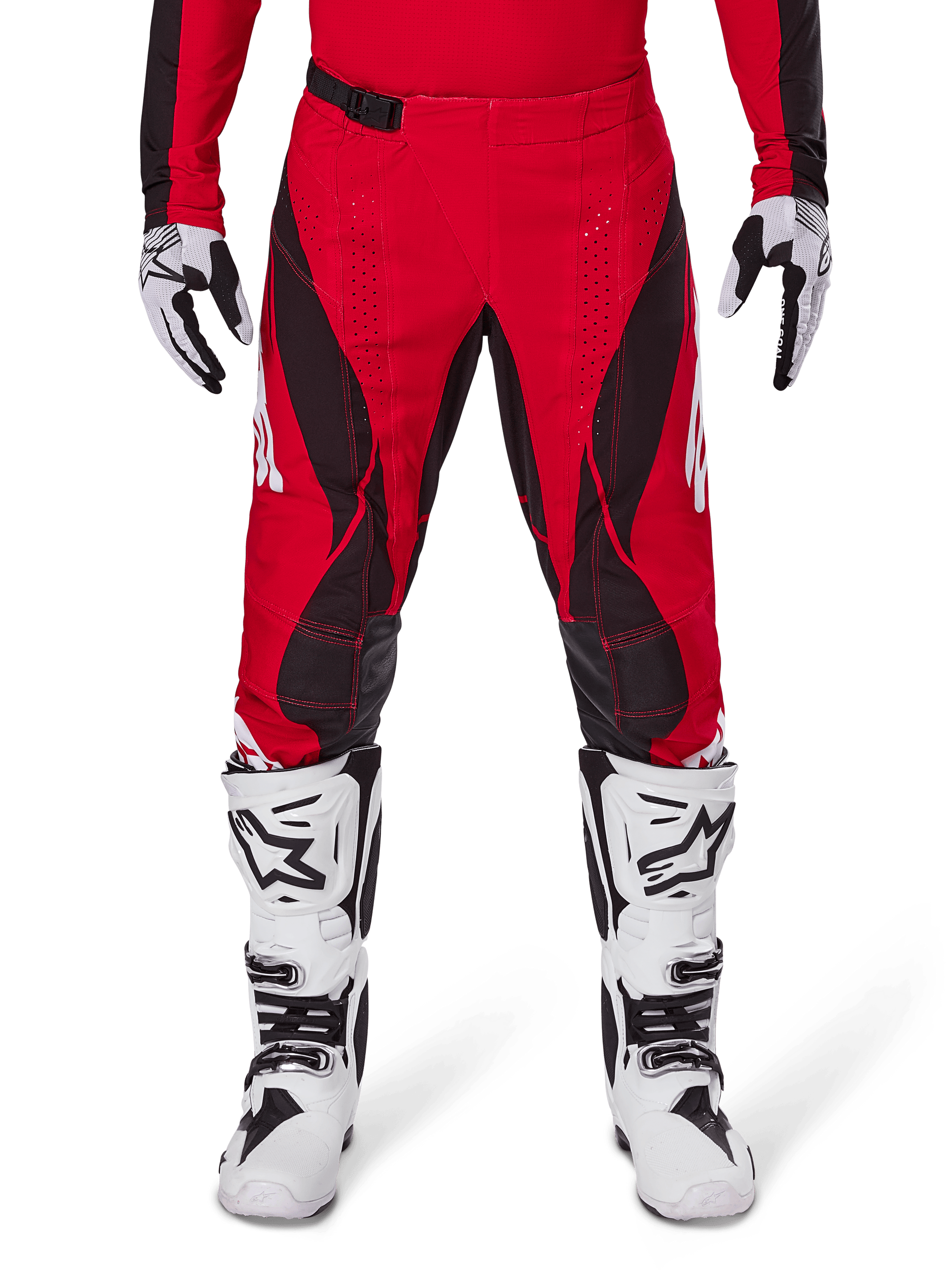 Alpinestars 2025 Techstar Dreem Pants, Motocross Pants, Bright Red and Black, featuring angular patterns and laser-cut ventilation holes, worn with white motocross boots and matching gloves for off-road racing