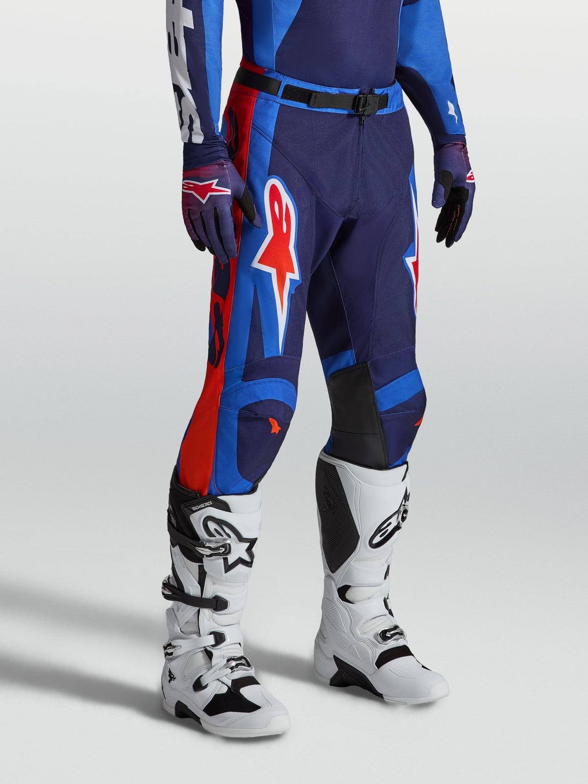 Alpinestars Racer Hunt Pants, Motocross Riding Pants, Men's, Blue and Fire Red, durable 600D polyfabric with ergonomic pre-curved race fit.